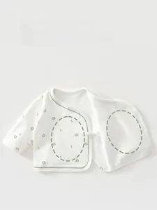 Detail view of cotton newborn kimono wrap featuring double-layer belly protection