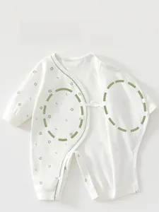 Detail of baby cotton jumpsuit featuring a floral print and double-layer belly protection