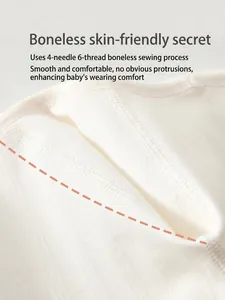 Seamless 4-needle 6-thread stitching on soft white cotton ribbed baby bodysuit