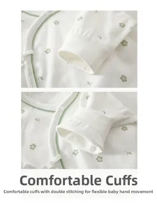 Detail of comfortable baby bodysuit cuffs with reinforced double-stitch craftsmanship