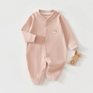Barboteuse bébé rose en coton côtelé avec manches longues et broderie petit chien
