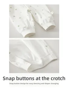 Detailed resin snap buttons on baby floral cotton romper for easy diaper changing