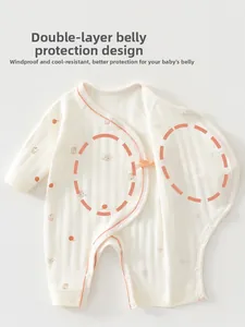 Detail of newborn baby ribbed cotton romper with double-layer belly protection design