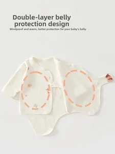 Detail of baby long sleeve bodysuit featuring double-layer belly protection and side ties