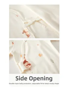Detail of baby cotton bodysuit with side tie design and winter snowman pattern print