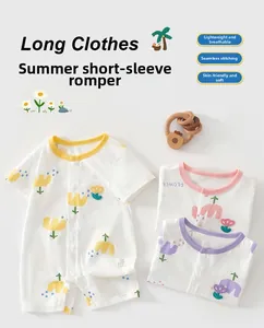 Detailed view of breathable cotton baby rompers with snap closures and cartoon flower patterns