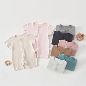 Detailed view of breathable cotton baby romper featuring snap buttons and 59/44 size label