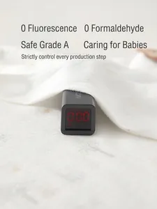 Safe newborn white muslin romper showing zero fluorescence and zero formaldehyde testing