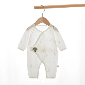 Detailed view of white cotton baby romper with elephant embroidery and 52/40 size tag