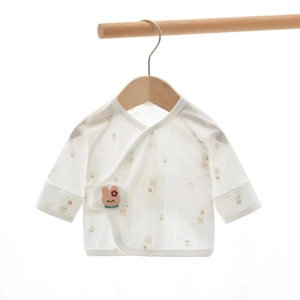 Detail of newborn baby cotton kimono top with cute bunny embroidery and floral print