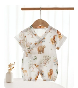 Detailed macro view of breathable double-layer bamboo cotton gauze fabric on baby romper