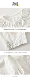 Detail view of floral baby romper featuring ruffled collar and soft flatlock stitching