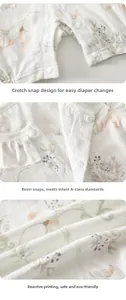 Detail of floral baby bodysuit featuring resin snap buttons and ruffles for easy dressing
