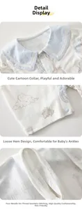 Detail of baby cotton romper with Peter Pan collar and flatlock stitching for comfort