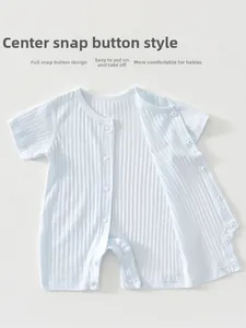 Close-up of baby short sleeve romper with breathable ribbed cotton fabric and snap fasteners