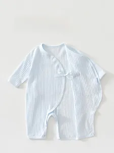 Detail of light blue baby romper featuring double-layer belly protection and ribbed cotton fabric