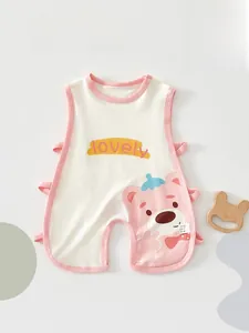 Detail of baby sleeveless romper with pink bear print and soft cotton side-tie design