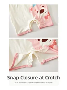 Close-up of cotton baby bodysuit snaps for easy diaper changes and dressing