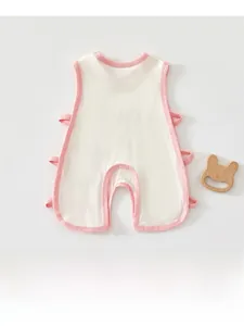Detail of baby romper featuring pink trim edges and durable double-stitched sewing