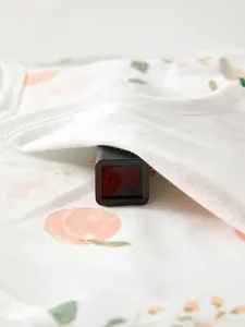 Organic cotton newborn baby shirt with peach print and zero fluorescence safety test