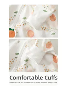 Close-up of double-stitched ribbed cuffs on peach print cotton baby kimono top
