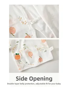 Detail of newborn cotton wrap top with peach print and side-tie belly protection design