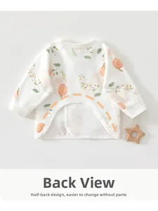 Detail of peach print baby kimono top with back opening design for easy diaper change