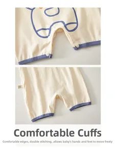 Detail of baby sleeveless romper showing snap buttons at the crotch and soft double stitching