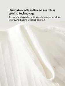 White cotton ribbed baby romper featuring smooth 4-needle 6-thread seamless stitching