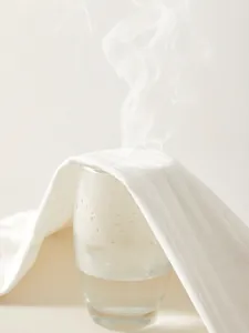 Tissu respirant en coton pour barboteuse bébé montrant l'évacuation de l'humidité