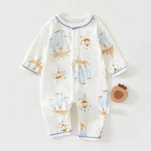 Detail view of cotton baby bodysuit with hot air balloon prints and blue ribbed cuffs