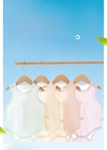 Detail of newborn summer bodysuits in macaron colors with breathable ribbed fabric