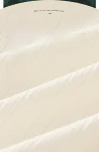 Macro shot of breathable 100% pure cotton fabric texture for newborn baby clothes