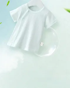 Detail of mint green baby short sleeve shirt with breathable micro-mesh cotton fabric