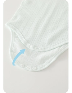 Close-up of baby bodysuit with breathable cotton fabric and convenient crotch snaps