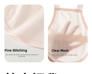 Detail of pink cotton baby bib featuring breathable mesh fabric and durable flatlock seams