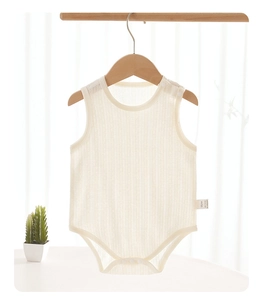 Detail of baby sleeveless cotton bodysuit featuring ribbed texture and shoulder snap buttons