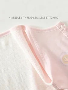 Pink breathable mesh baby romper with smooth flatlock seams and yellow smiley print