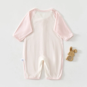 Breathable mesh texture on long sleeve baby bodysuit with raglan sleeves and soft fabric
