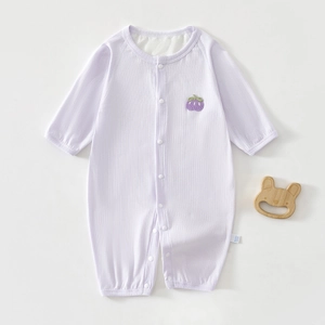Detail of light purple ribbed cotton baby romper with berry embroidery and size label