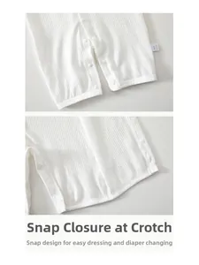 Macro detail of breathable waffle fabric baby romper with snap buttons at the crotch