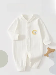Close-up of baby romper showing soft ribbed cotton fabric and cute bunny embroidery