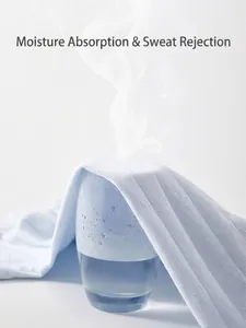 Breathable baby cotton bodysuit fabric showing steam test for airflow and comfort