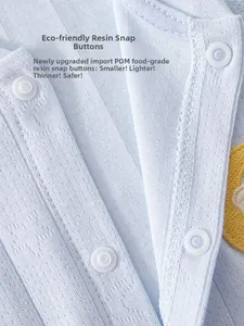 Macro detail of breathable cotton baby romper featuring food-grade POM resin snaps
