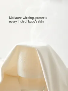 Breathable white cotton baby bodysuit showing steam penetration for ventilation