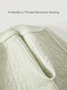 Quilted warm baby romper with moon-star texture and flatlock stitch detail