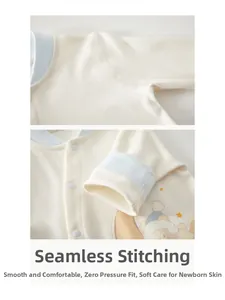 Detail of flat seams and soft cotton fabric on newborn bear print romper