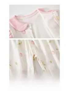 Detail showing soft cotton baby romper with resin snap buttons and cute floral print