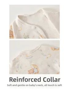 Detail of the soft cotton bound neckline and snap button on newborn long sleeve bodysuit