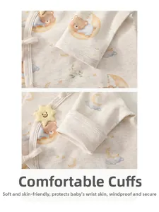 Detail view of the soft ribbed cotton cuffs with cute star trim on a baby bodysuit